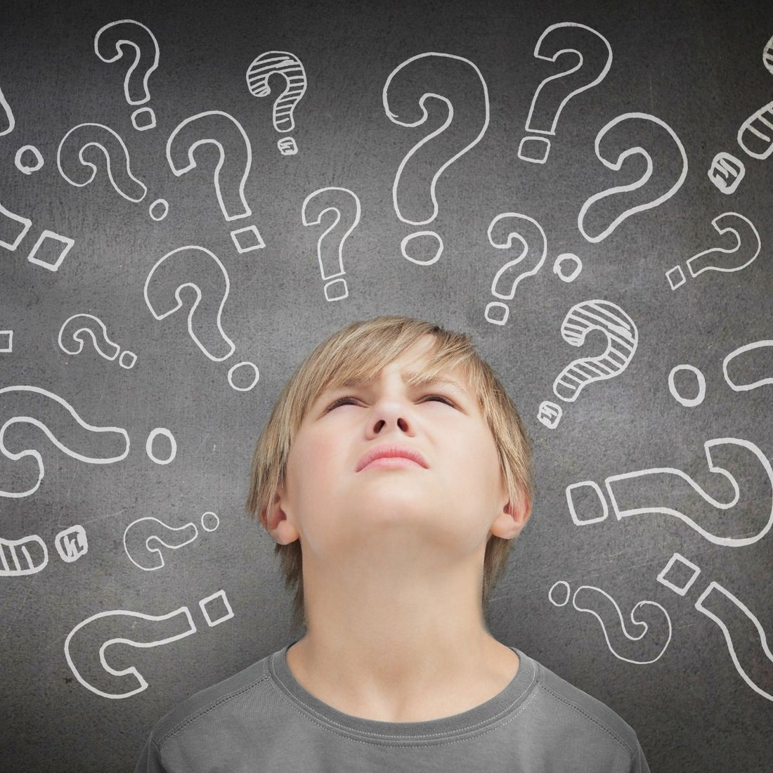 A confused and conflicted boy surrounded by question marks